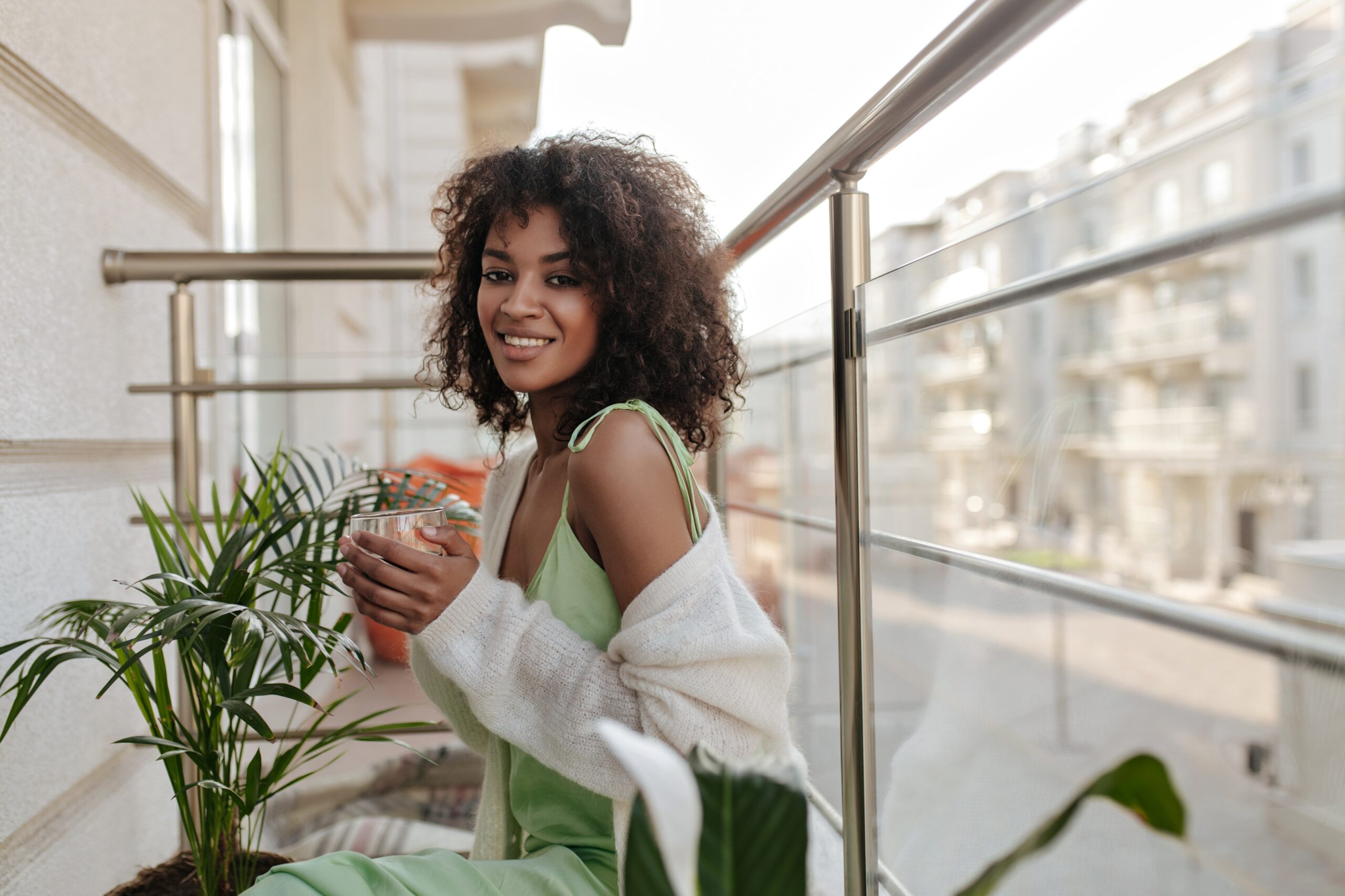 Young woman on balcony