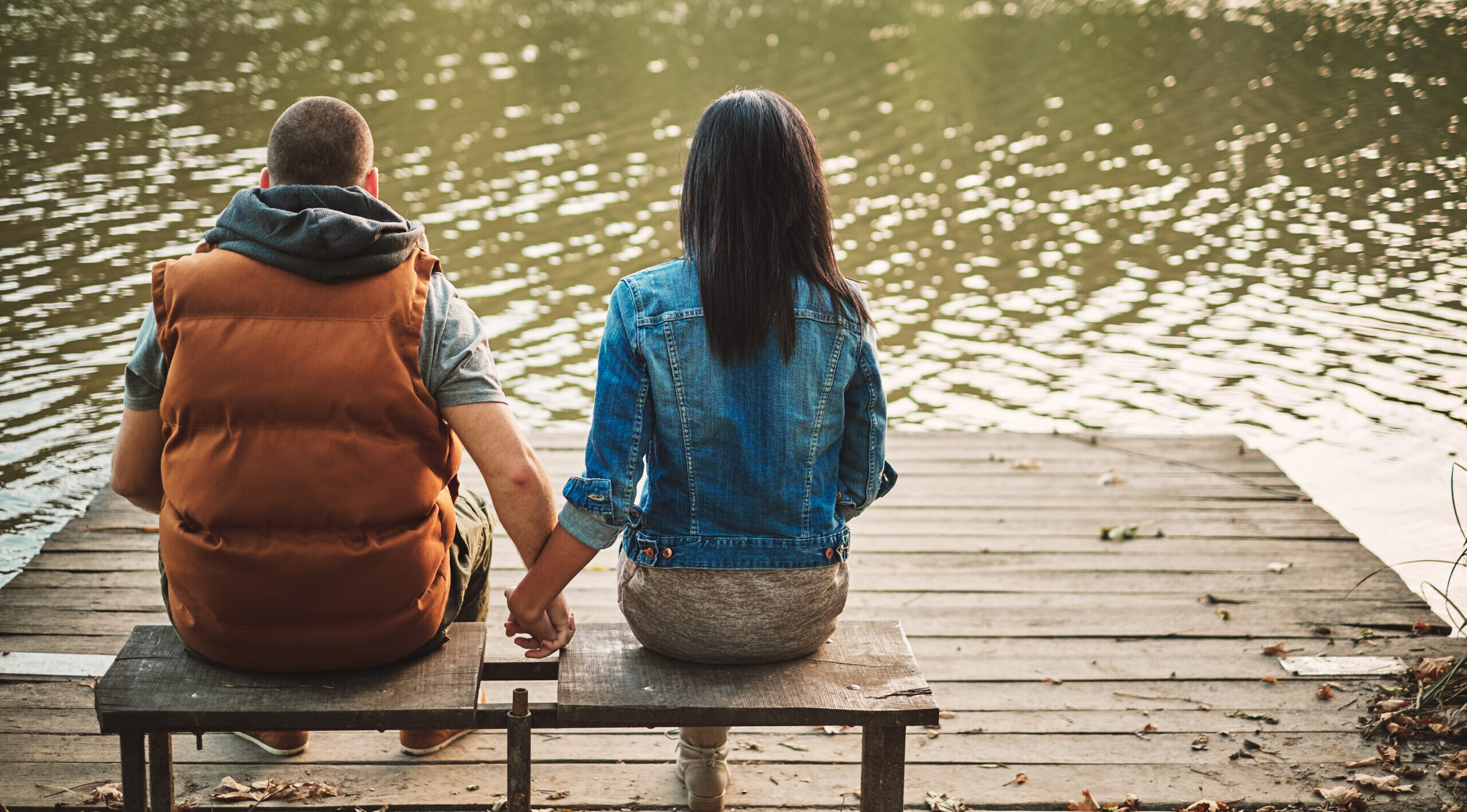Young couple holding hands