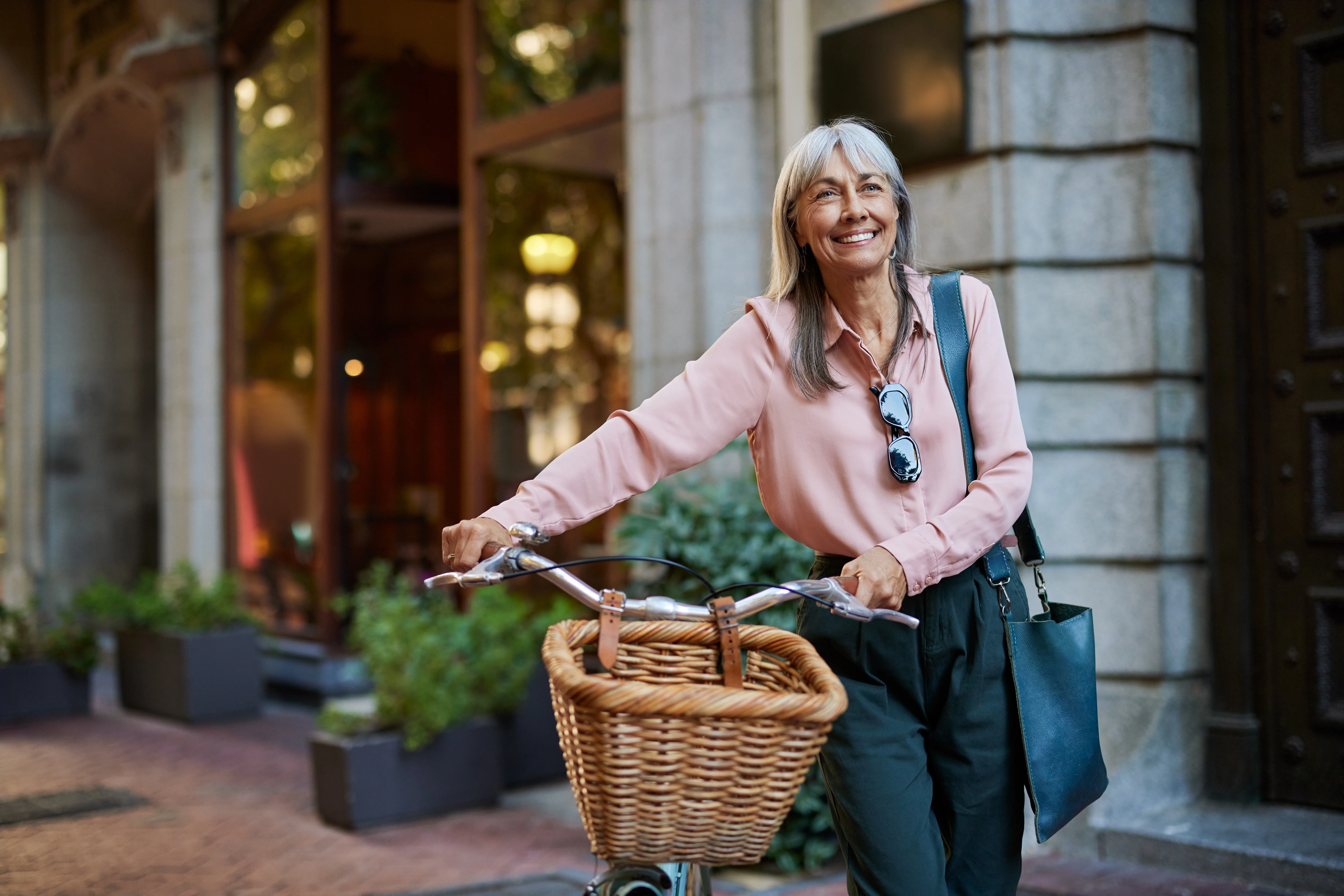 woman pushing bike