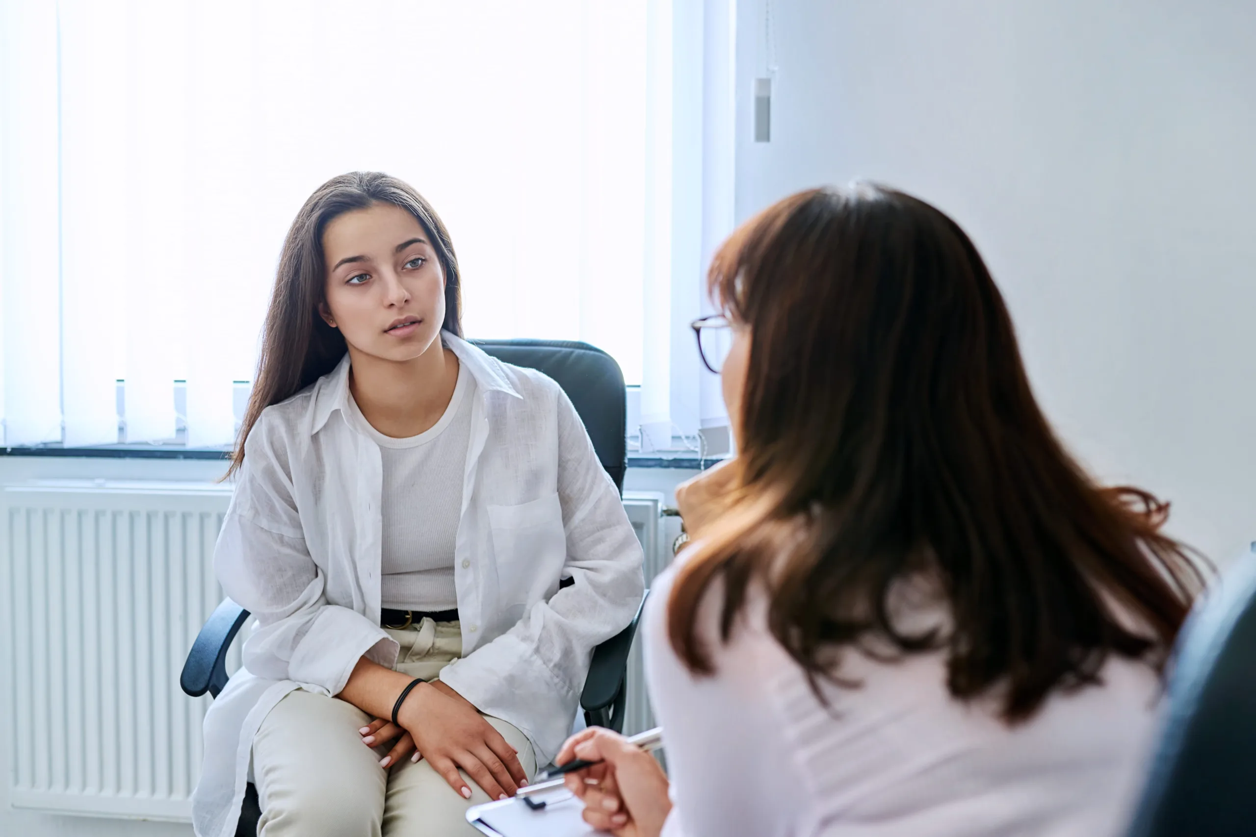 Doctor talking to patient